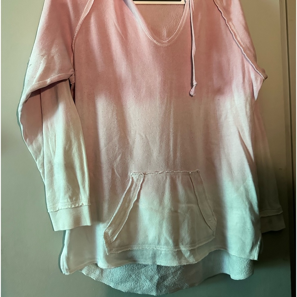 Pink ombré hooded pullover with front pocket slightly longer in back